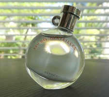 MINIATURE DE PARFUM  HERMES EAU DES MERVEILLES pendentif  7.5ml