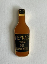 60 -  Pin's ALCOOL APERITIF - BOUTEILLE DE REYNAC LE PINEAU DES CHARENTES