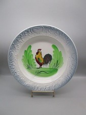 Plat creux ancien en faïence