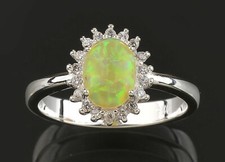    Bague en argent, Opale de Feu 7x5 mm et Zircons