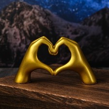 Sculpture mains coeur doré