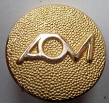 Bouton plat en métal doré