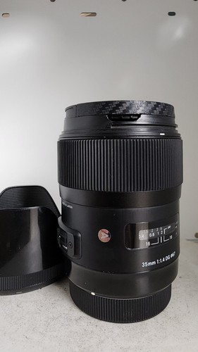 Objectif sigma f 1 4 - dg, f/1,4