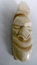 tete tiki sculptée en platre