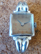 TRES ANCIENNE MONTRE DAME DES ANNEES 1940-45 à gonds chromée