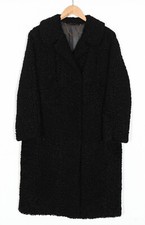 Manteau noir en fourrure