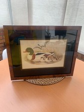 cadre représentant un canard coloris marron brillant Représentant un canard trè 