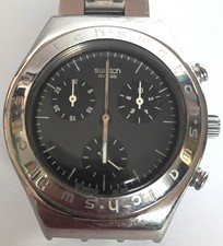 Swatch Chronograph Irony 1999 YMS103G Tout Acier. Très bon état. Traces d'usures
