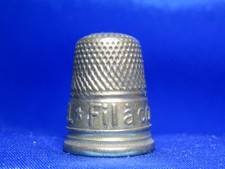 dé a coudre publicitaire en laiton  " Fil a coudre CRESPEL "