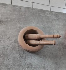 Un grand mortier et son pilon