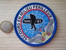 écusson pompier milieu