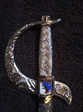 Coupe papier métal, épée