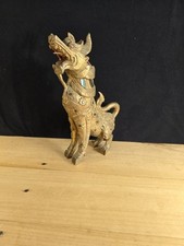 sculpture en bois doré lion