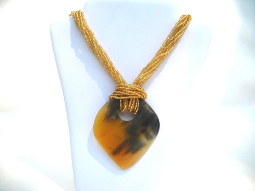 Hand made gold - made, bead