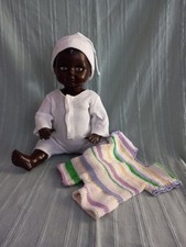 Poupon baigneur noir de Petitcollin