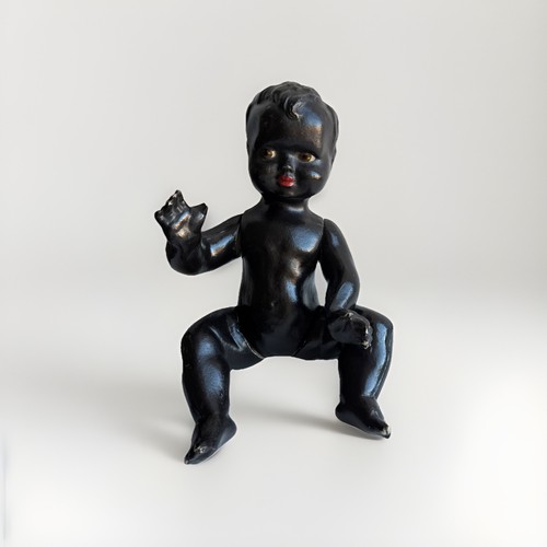 Ancien poupon noir - , en