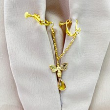 Pince doré lèvres non