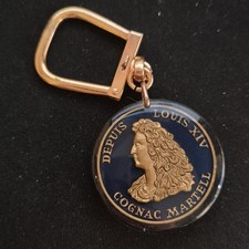 PORTE CLÉ ANCIEN PUBLICITAIRE