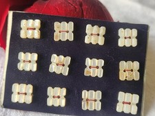 Rare  plaque lot 12 boutons