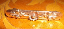 Ancienne broche à bavoir  plaquée or rose
