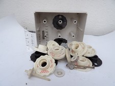 Lot de pièces pour machine à coudre Singer. A déterminer