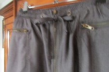 JUPE COURTE COULEUR GRISE DE KARL MARC JOHN. TAILLE M