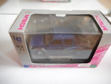 Pick-up Mtech Nissan Datsun en bleu au 1:43 en boîte