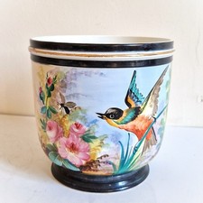 Joli cache pot en porcelaine
