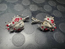 Vintage pair of ladybug hair clips adorned with red and clear rhinestones
