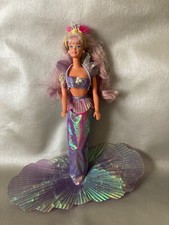 Jolie poupée BARBIE Magical