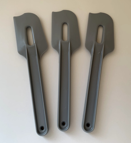 New tupperware paddle - new, 8"