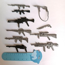 Lot d'armes pour figurines années 80-90