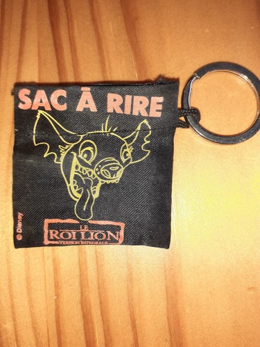 Porte clé roi lion - porte,