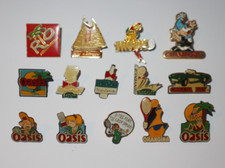 Lot de 14 Pin's + Attaches