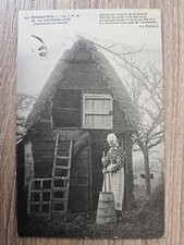 Cpa 14 - LA VIE NORMANDE - Fabrication du beurre (la baratte)