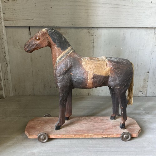Cheval sur roulettes métal - sur,