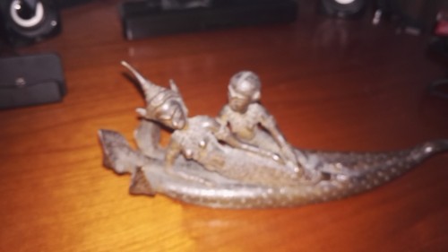 Superbe oiseau bronze aux - en,