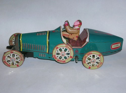 Ancien jouet mécanique - , en