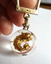 Ancien porte clé Bourbon Boule Sphérique Journal Le Dauphiné Libéré, Années 60