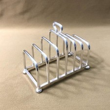 porte toasts ART DECO en métal argenté (support grille présentoir table pain )