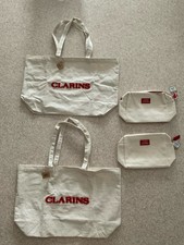 Lot 2 Sacs De Plage Et 2 Trousses Clarins Neuf 
