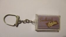 Porte clé vintage contenant  mini tablette de Chocolat Milka SUCHARD Zaventem