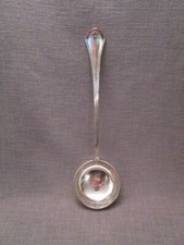 louche ancienne en métal