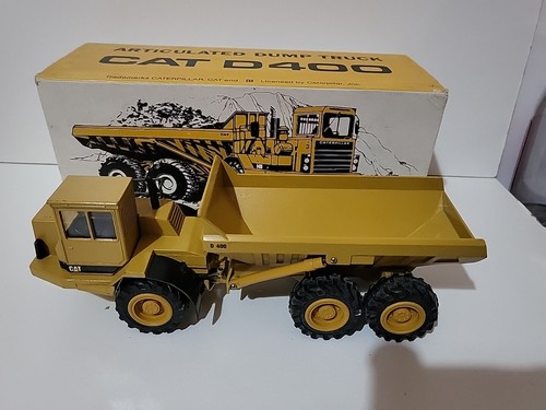 Dumper articulé caterpillar - articulé,