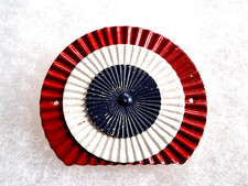 Une cocarde de shako militaire