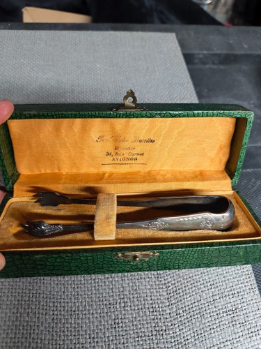 Pince sucre metal argenté - à,