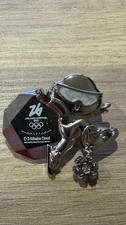 Pin's Alibaba patinage  JO