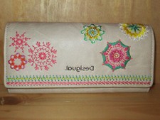 Q.portefeuille DESIGUAL