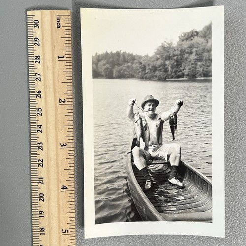 Vintage 1950s fisherman canoe - vintage,