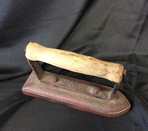 Pressing iron with - with, wooden